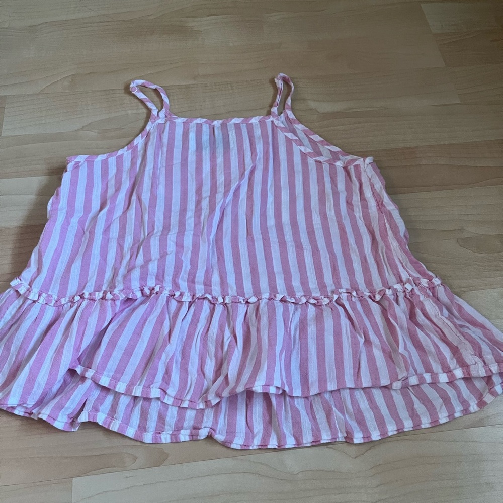 This is a barely worn kids old navy tank top! Perfect for any summer activity.